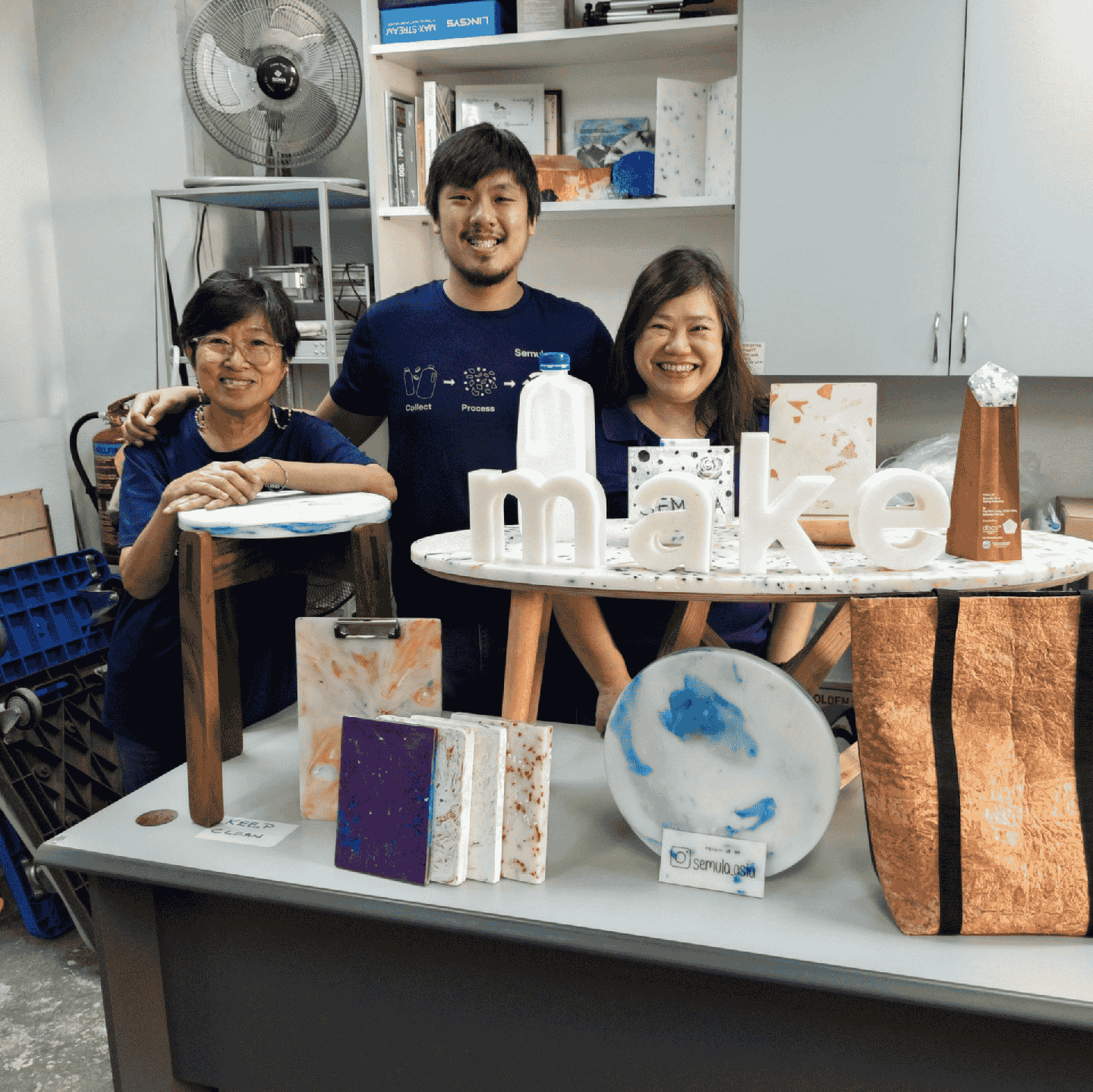 Hands-on collaboration at a Semula Asia corporate workshop, fostering teamwork through circular design.