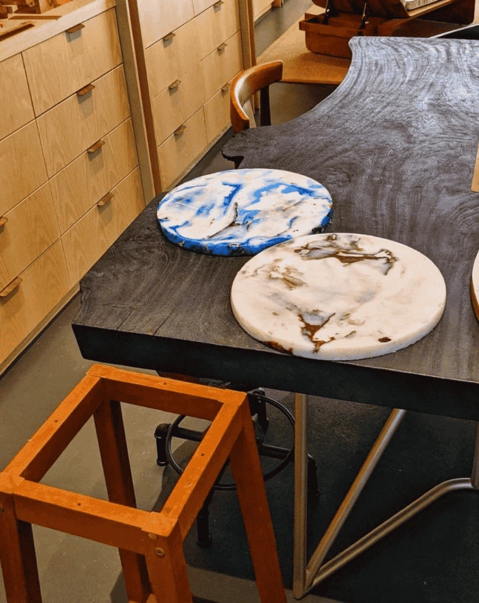 Stylish bar stool handcrafted from 100% upcycled plastic, featuring a unique marbled pattern that makes every piece one-of-a-kind.