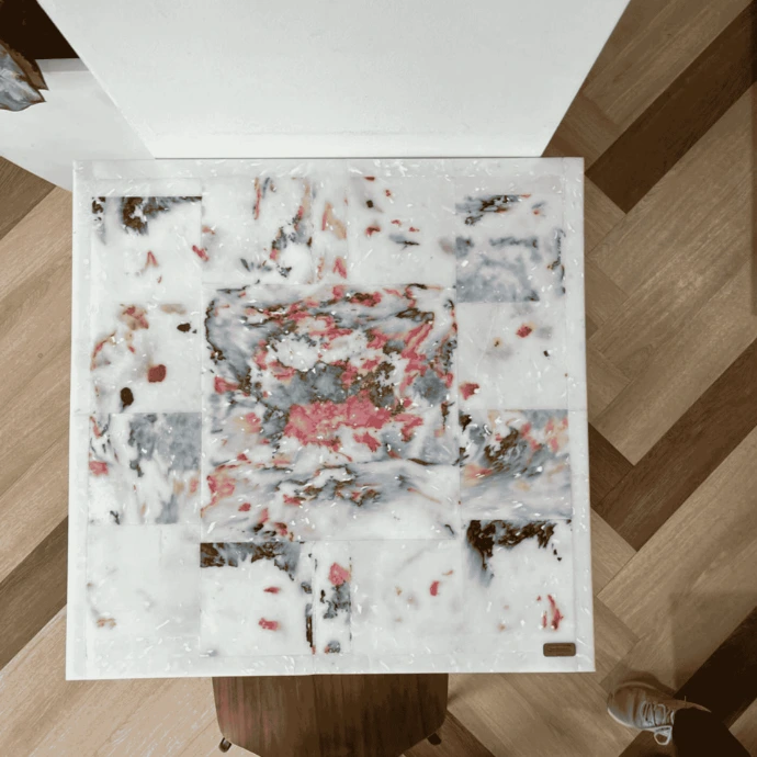 Contemporary abstract art piece handcrafted from shredded plastic flakes and heat-pressed materials.